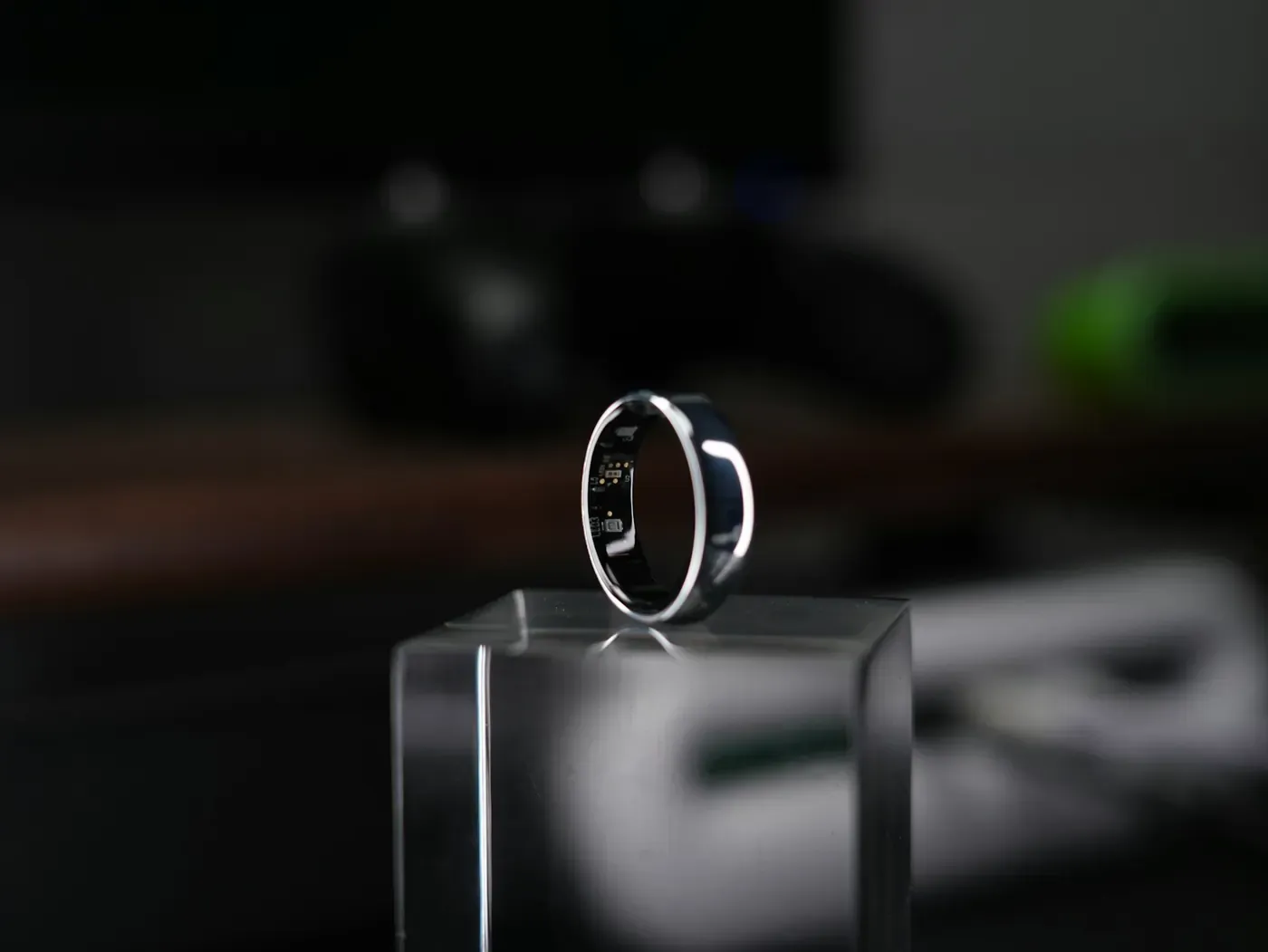 A smart ring presented on a display stand